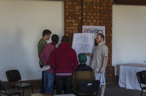 Dr. Bassett explains physical concepts to participants of JEDI Namibia