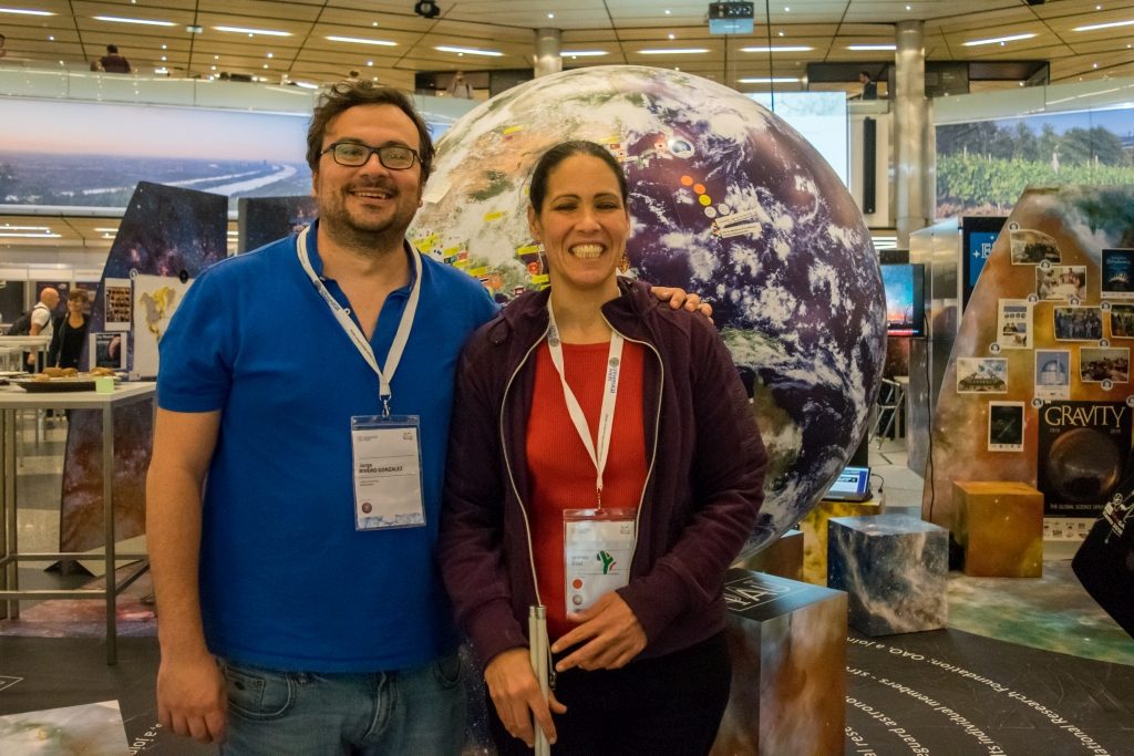 Jorge Rivero, IAU 100 coordinator and Wanda Diaz Merced, OAD researcher at the IAU Exhibition 